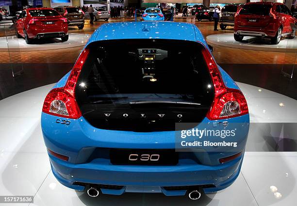 The Volvo AB C30 vehicle sits on display at the company's booth during the LA Auto Show in Los Angeles, California, U.S., on Thursday, Nov. 29, 2012....