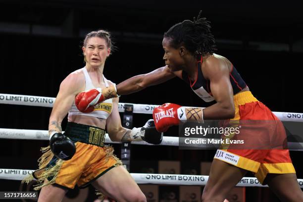 Millicent Agboegbulen throws a punch during the Super welterweight bout between Tayla Harris and Millicent Agboegbulen at Hoops Capital East on July...