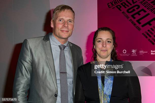 Paul Hobson and Tania Bruguera pose as Teresa Margolles was today announced as the winner of the Artes Mundi 5 prize at the National Museum Cardiff...