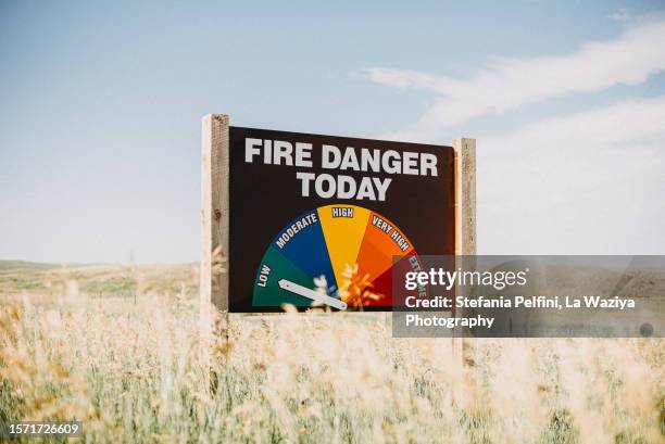 fire danger today warning sign - severe weather alert stock pictures, royalty-free photos & images
