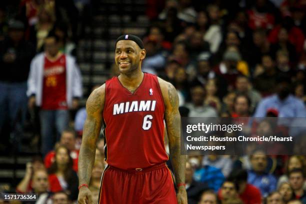 Miami Heat small forward LeBron James smiles during the second half of the Houston Rockets vs. Miami Heat NBA basketball game at the Toyota Center...