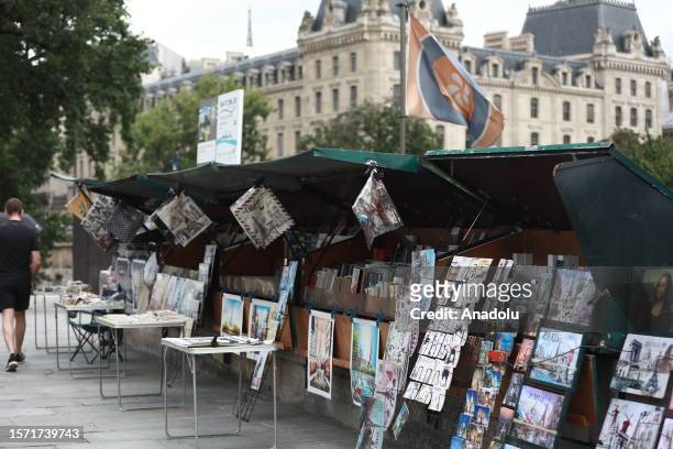 The traditional outdoor booksellers are seen on the Seine River in Paris, France on July 29, 2023. Les Bouquinistes that have been there for years to...
