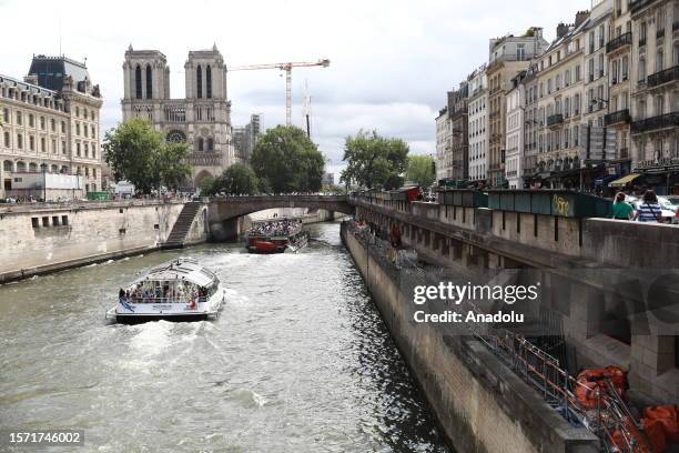 View of the traditional outdoor booksellers are seen on the Seine River in Paris, France on July 29, 2023. Les Bouquinistes that have been there for...