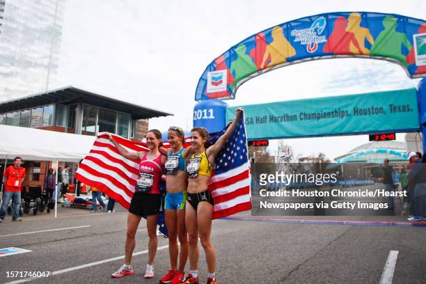 Nan Kennard, 3rd place, , Jen Rhines, 1st place, and Serena Burla, 2nd place, pose for a photo during the Women's 2011 USA Half Marathon National...