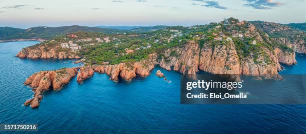 rock cliff and caves in cap de begur, costa brava, calonia, spain - catalonia stock pictures, royalty-free photos & images