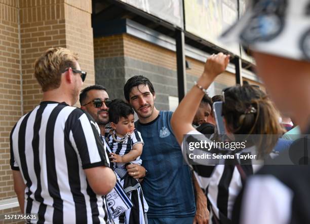 Sandro Tonali poses for photos with fans during the Pre Season Open Training session at the PACE Academy on July 25, 2023 in Atlanta, Georgia.