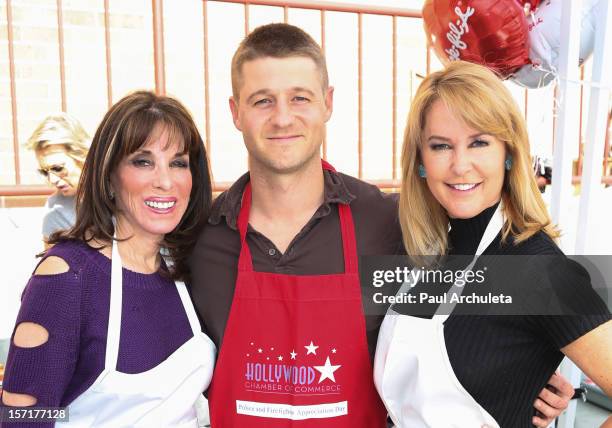 Actors Kate Linder, Ben McKenzie and Erin Murphy attend the Hollywood Chamber of Commerce salute to the Hollywood police and fire department on...