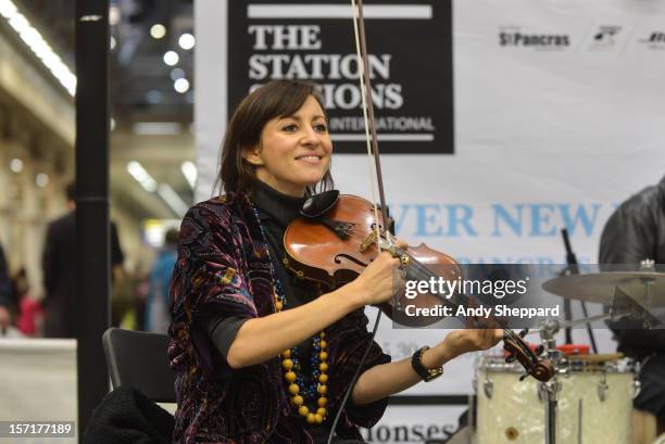 Violinist Anna Phoebe performs as part of the Station Sessions 2012 at St Pancras Station on November 29, 2012 in London, England.