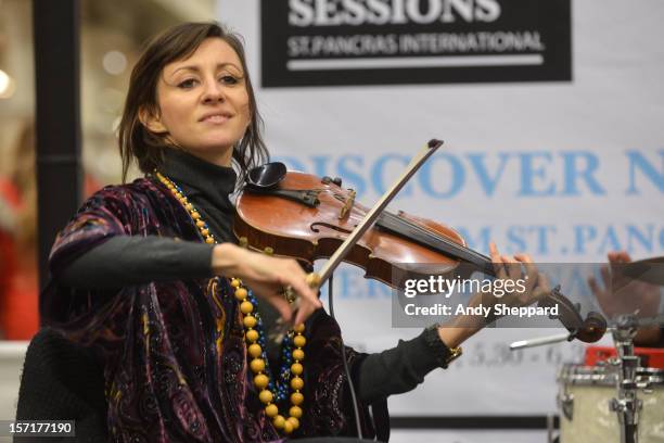 Violinist Anna Phoebe performs as part of the Station Sessions 2012 at St Pancras Station on November 29, 2012 in London, England.