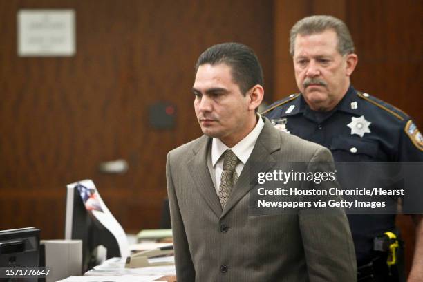 Jamie Zamora is taken out of the courtroom during a break during his trial at the 185th Court, Tuesday, March 8 in Houston. Last year, Zamora was...