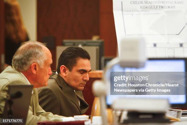 Jamie Zamora reacts as he sits beside is lawyer, Paul Looney, during his trial at the 185th Court, Tuesday, March 8 in Houston. Last year, Zamora was...