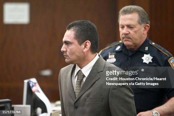 Jamie Zamora is taken out of the courtroom during a break during his trial at the 185th Court, Tuesday, March 8 in Houston. Last year, Zamora was...