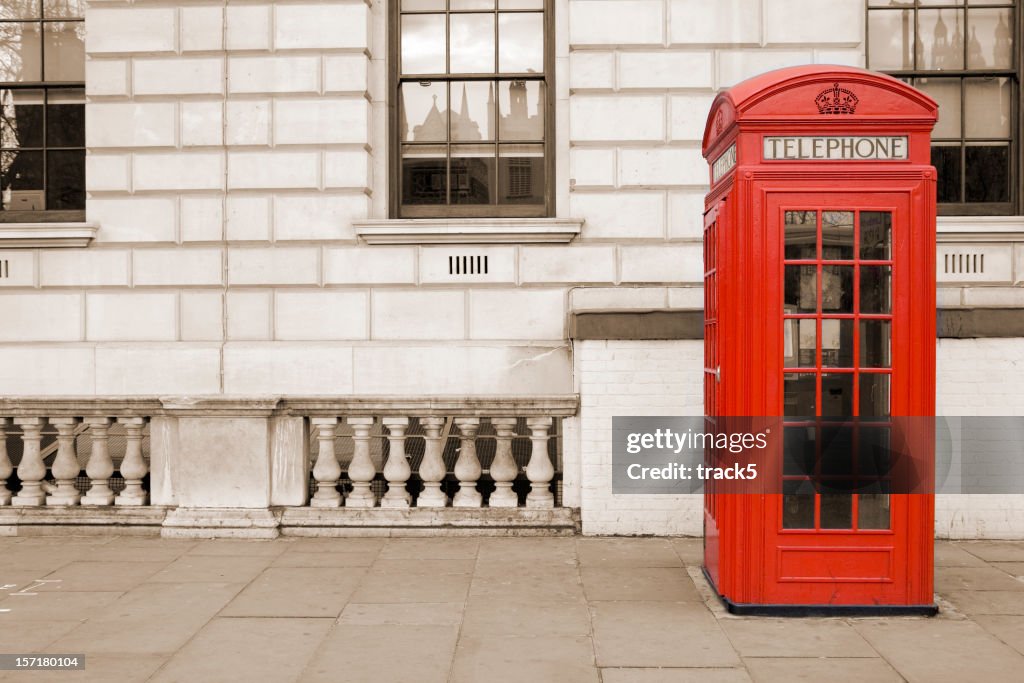 Old fashioned UK red telephone box on Whitehall, London