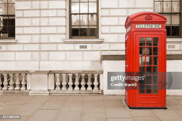 old fashioned uk red telephone box on whitehall, london - public booth stock pictures, royalty-free photos & images