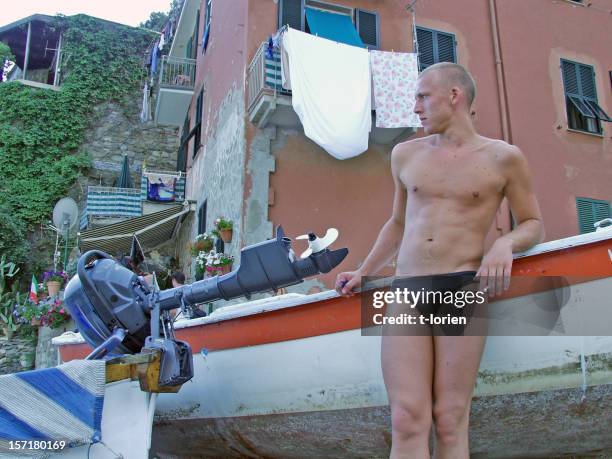 gigolo in italy (or checking out girls) - young men in speedos stock pictures, royalty-free photos & images