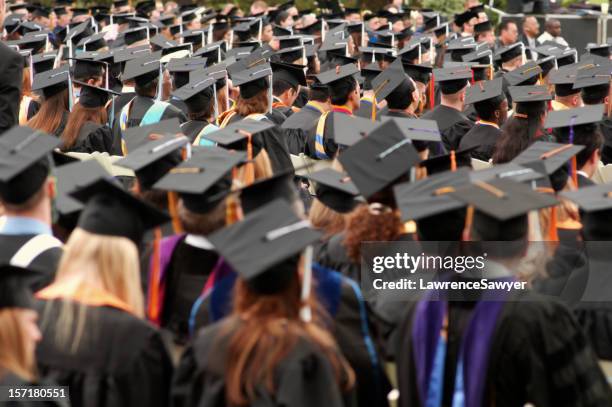 graduating class - colleges stock pictures, royalty-free photos & images