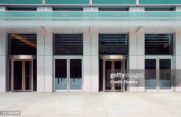 entrance - revolving door stock pictures, royalty-free photos & images