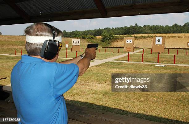 Shooting Rangemaster Target Shooting At The Range Master Gun Range Photos and Premium High ...