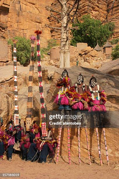 dogon dancers - tall masks and stilts - dogon people stock pictures, royalty-free photos & images