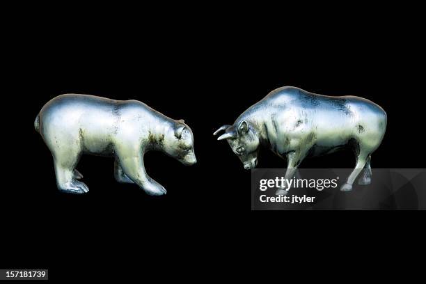 bull and bear - bull bear stock pictures, royalty-free photos & images