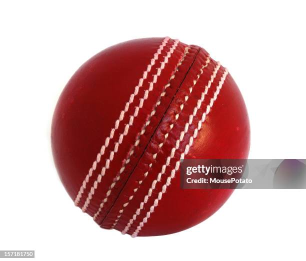 new leather cricket ball against white - cricket ball stock pictures, royalty-free photos & images