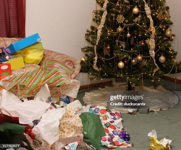 after the christmas party - torn gift stock pictures, royalty-free photos & images