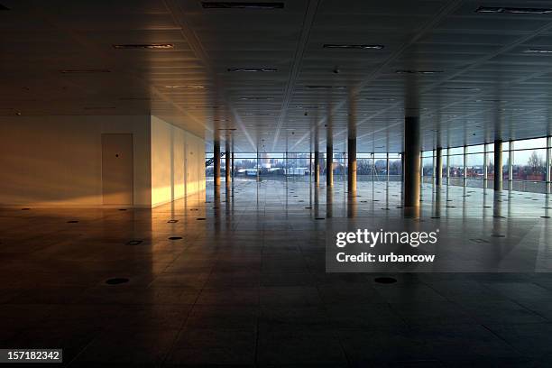 empty office interior, lit wall - dark empty office stock pictures, royalty-free photos & images