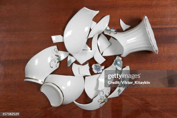 broken white porcelain vase on wooden floor - vas bildbanksfoton och bilder