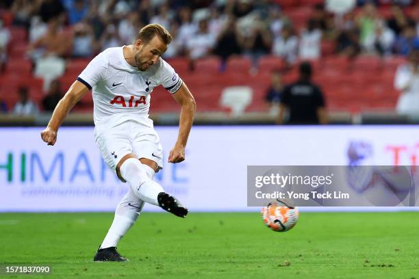 Harry Kane of Tottenham Hotspur scores a penalty for his team's first goal against the Lion City Sailors during the first half of the pre-season...