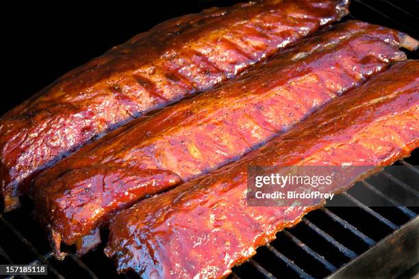 smoked baby back ribs. - bbq smoker stock pictures, royalty-free photos & images