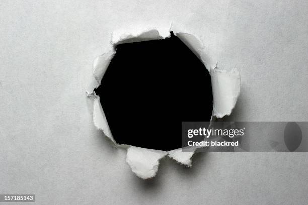 paper explosion - bullet hole stock pictures, royalty-free photos & images