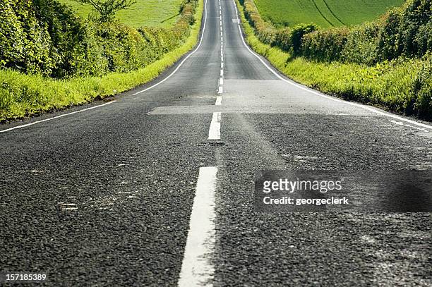 straight downhill - dividing line stock pictures, royalty-free photos & images