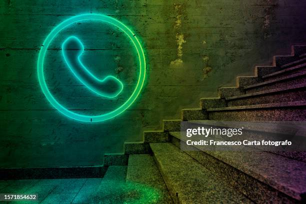 telephone sign - telephone receiver stock pictures, royalty-free photos & images