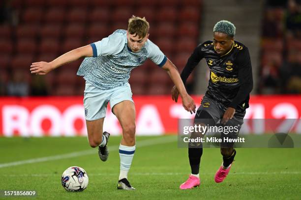 David Brooks of AFC Bournemouth is challenged by Kyle Walker-Peters of Southampton during the Pre-Season Friendly between Southampton FC and AFC...