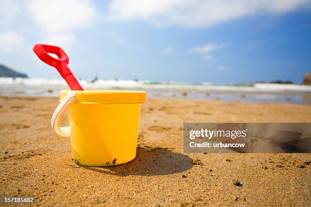 bucket and spade - sand pail and shovel stock pictures, royalty-free photos & images