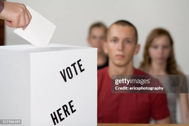 several young people in line to vote - ticket election stock pictures, royalty-free photos & images