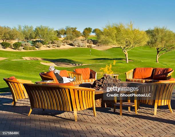 relaxing by the fire pit - arizona golf stock pictures, royalty-free photos & images