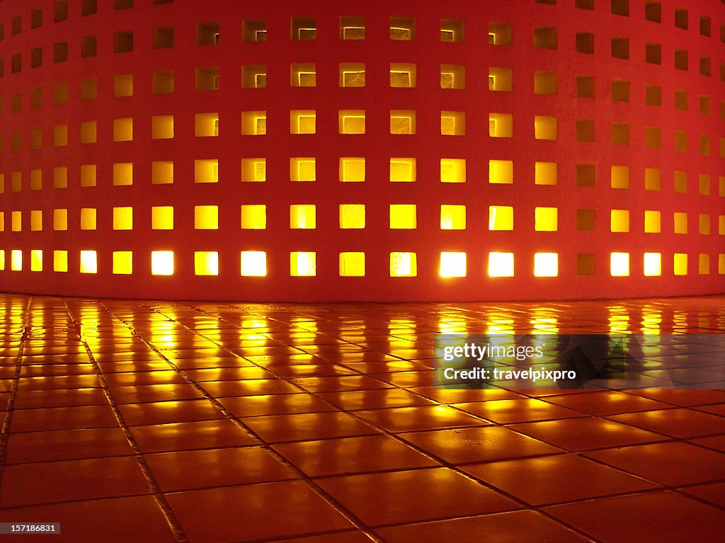 Glowing Wall Reflected on Smooth Saltillo Tile