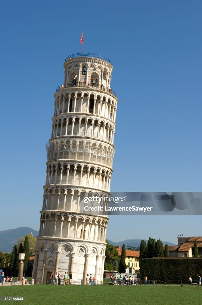 Leaning Tower of Pisa with a flag on top