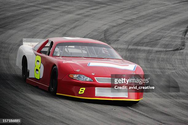 motorsports-red race car - car racing stock pictures, royalty-free photos & images