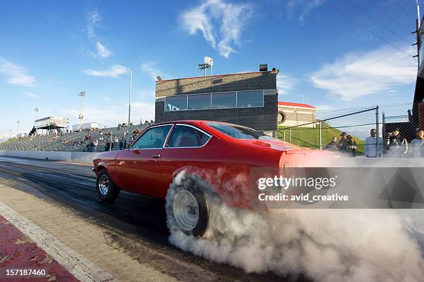 red race car on drag strip - drag race car stockfoto's en -beelden