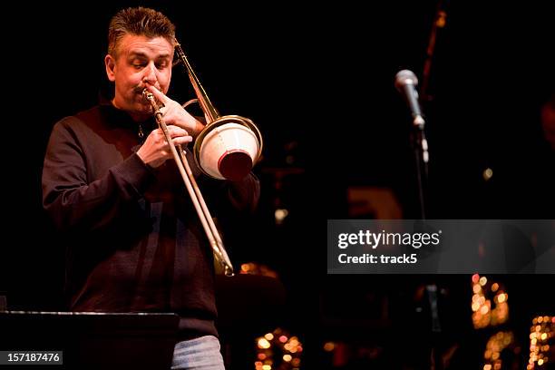 horn solo - trombone stock pictures, royalty-free photos & images