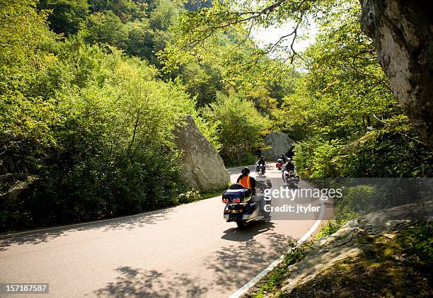 motorcycles in the mountains - motorbike ride stockfoto's en -beelden