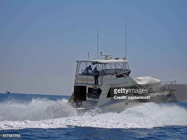action at sea - motor yacht stock pictures, royalty-free photos & images