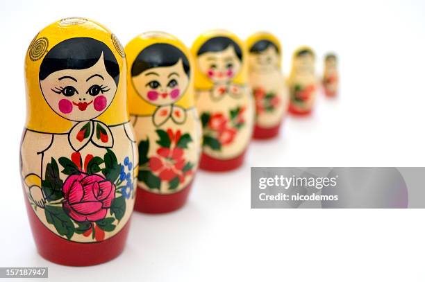russian toys in line - russian nesting doll stock pictures, royalty-free photos & images