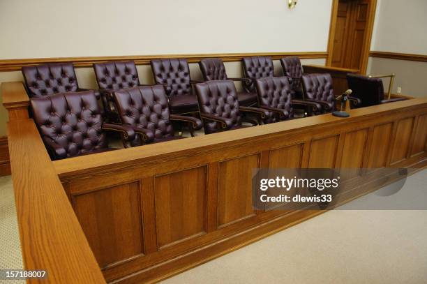 american jury box, wood trim and white walls in background - jury box stock pictures, royalty-free photos & images