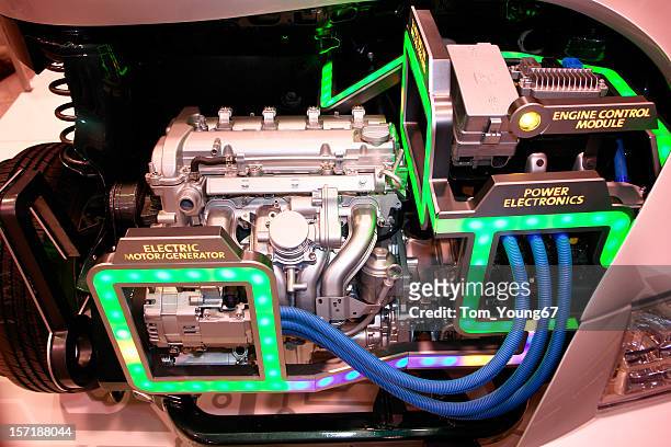 electric motor - fahrzeug mit hybrid antrieb stock-fotos und bilder