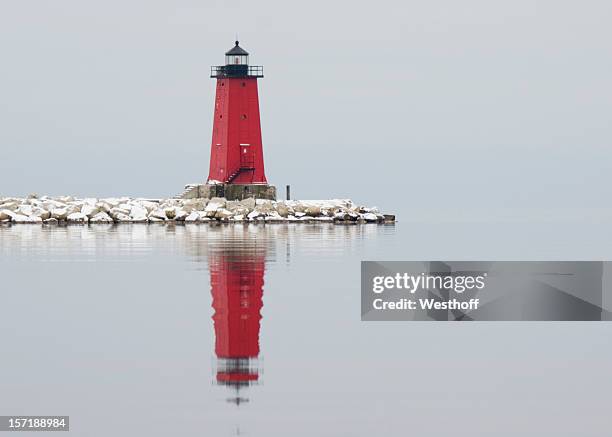 manistique east breakwater light - michigan winter stock pictures, royalty-free photos & images