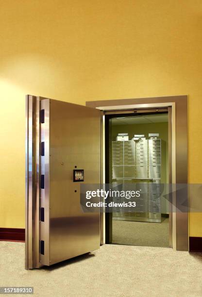 safe deposit boxes inside vault - bank vault stock pictures, royalty-free photos & images