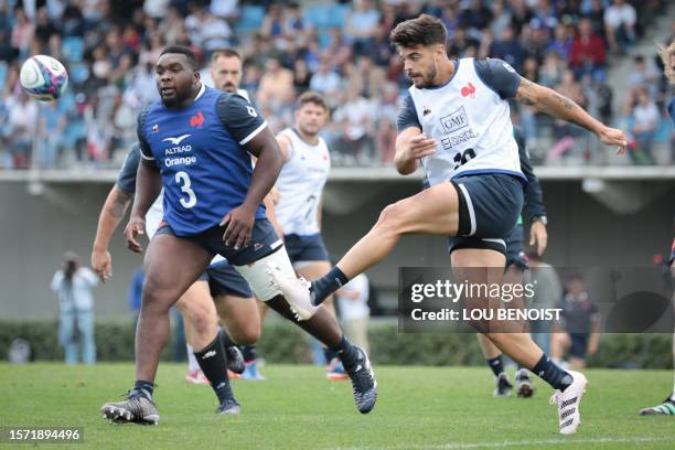 France's fly-half Romain Ntamack kicks the ball during a training session, as part of France's national rugby union team's preparations ahead of the...